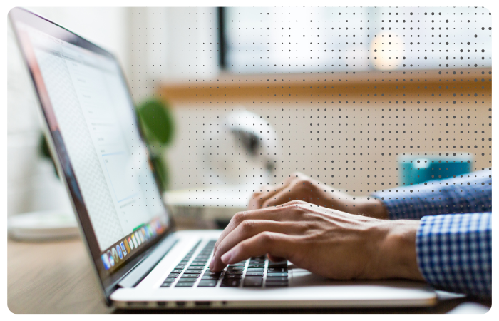 Whitepaper - man typing (700 x 450 px)